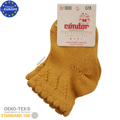 Chaussettes b&eacute;b&eacute; fille en coton jaune moutarde motif ajour&eacute;